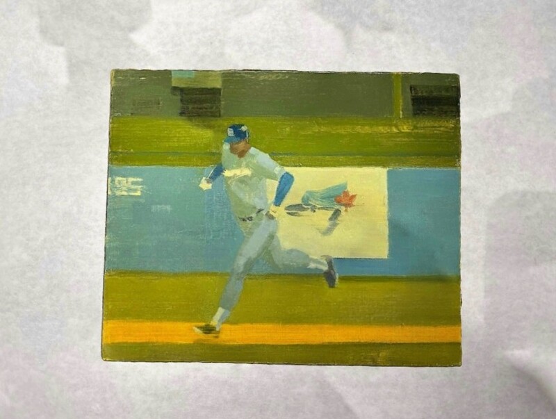 A small painting depicts a baseball player running across a baseball field, wearing a light-colored uniform and blue cap. The background features green and blue stadium seating and a blurred advertisement, with yellow and green tones dominating the scene.